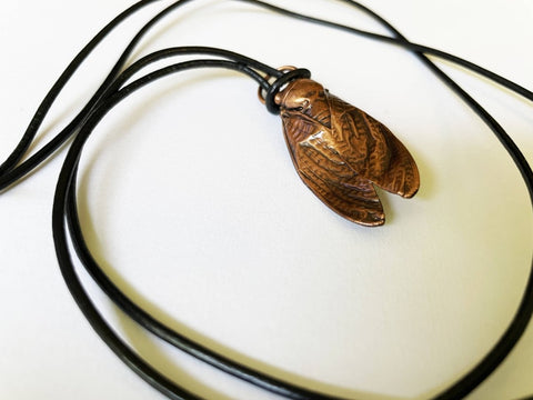 Cicada Sculpture and Necklaces